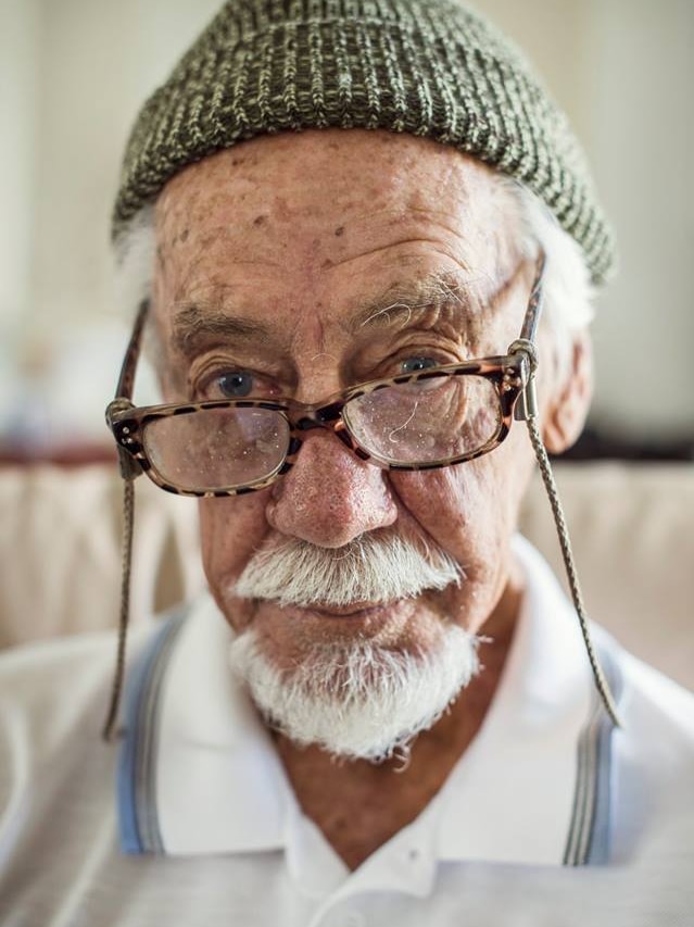 A head shot of Bob Gosbell looking over his glasses.