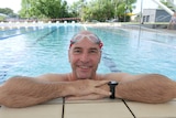 Swimmer Michael Wells perched on the edge of Parap pool in Darwin