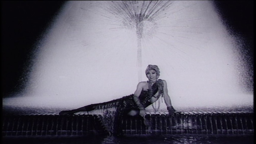 Ayesha poses in front of a fountain at Kings Cross in the 1960s.