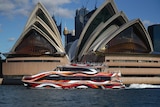 A Sydney fast ferry in front of Sydney Opera House