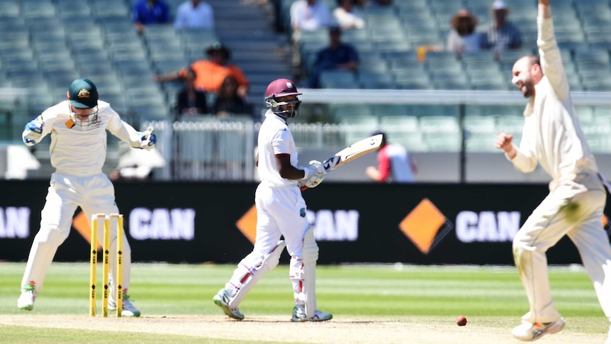 Jermaine Blackwood is out LBW to Nathan at the MCG