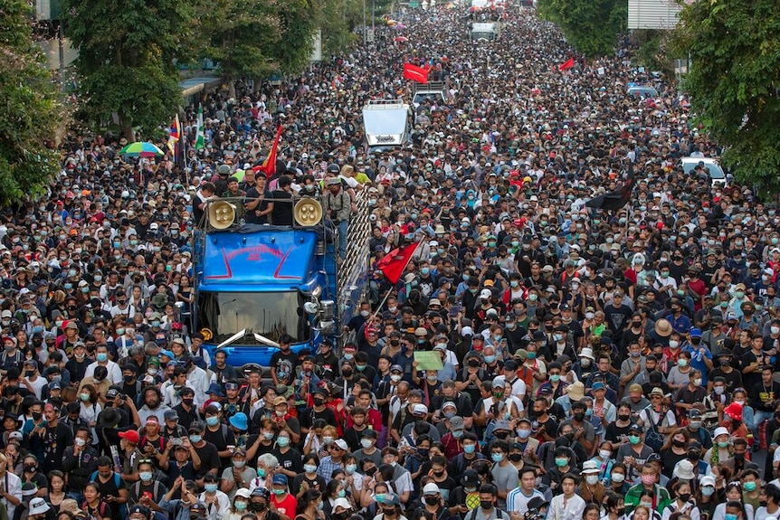 Pro-democracy protesters march during a street march in Bangkok, Thailand.