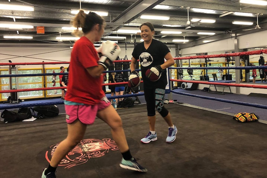 Shara Romer in the ring training at her gym.