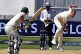The ball is seen in mid flight as England's Stuart Broad bowls to Australia's Steve Smith