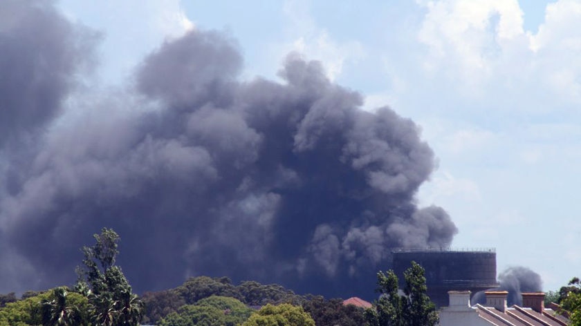 Smoke billows from a factory fire in Sydney's inner west