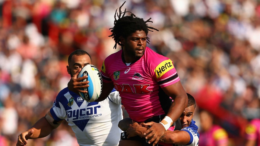 On the burst ... Jamal Idris looks to offload against the Bulldogs