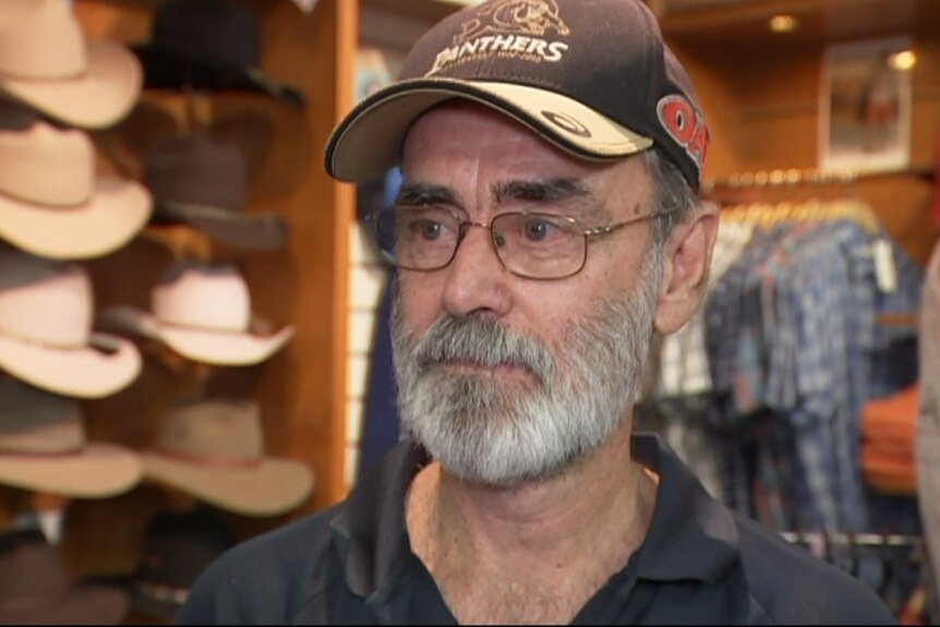 Katherine businessman Geoff Newton stands in his store.