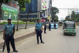 Bangladeshi police stand guard in Dhaka