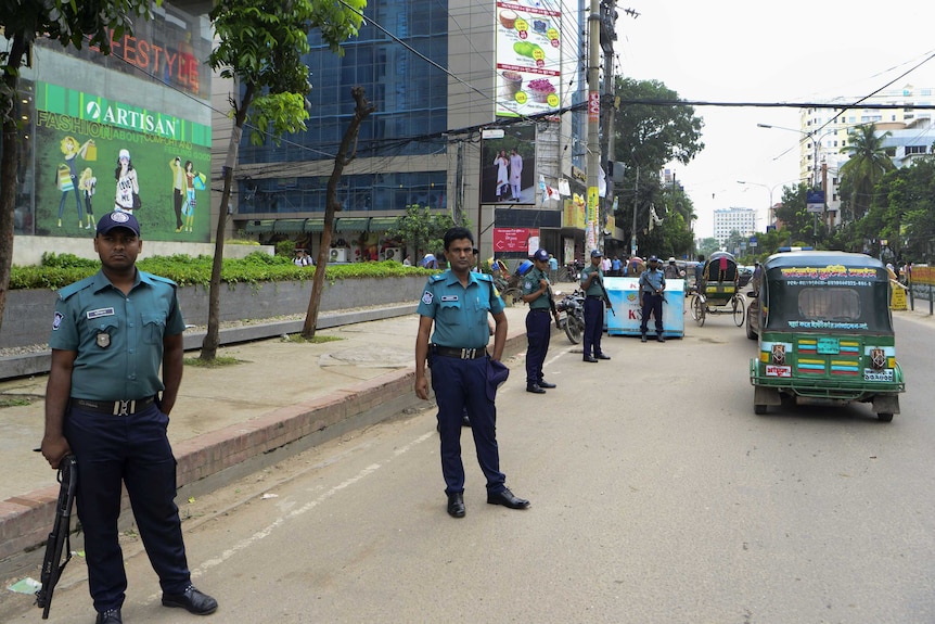 Bangladeshi police stand guard in Dhaka