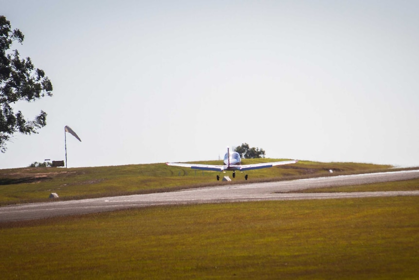 A plane comes into land at the Gympie airstrip.