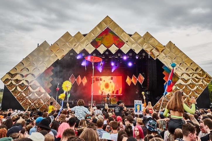 A large crowd watches a performance on stage at Beyond The Valley music festival.