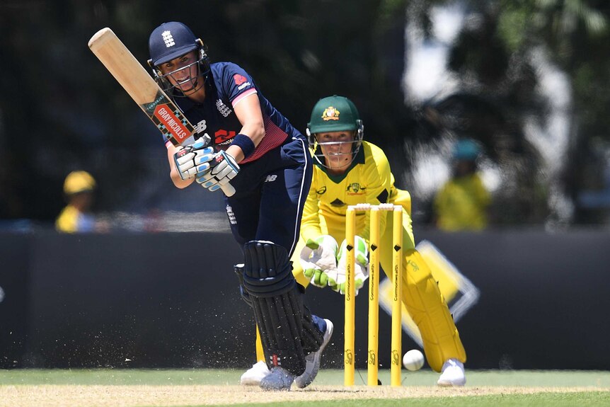 Lauren Winfield plays a shot to the leg side for England against Australia at Allan Border Field in Brisbane.