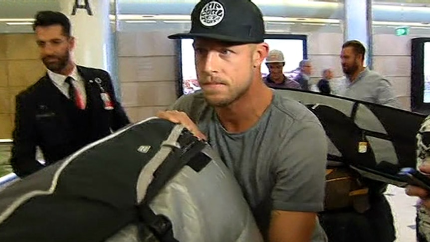 Mick Fanning arrives in Sydney