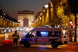 Police secure the Champs Elysees Avenue after one policeman was killed.
