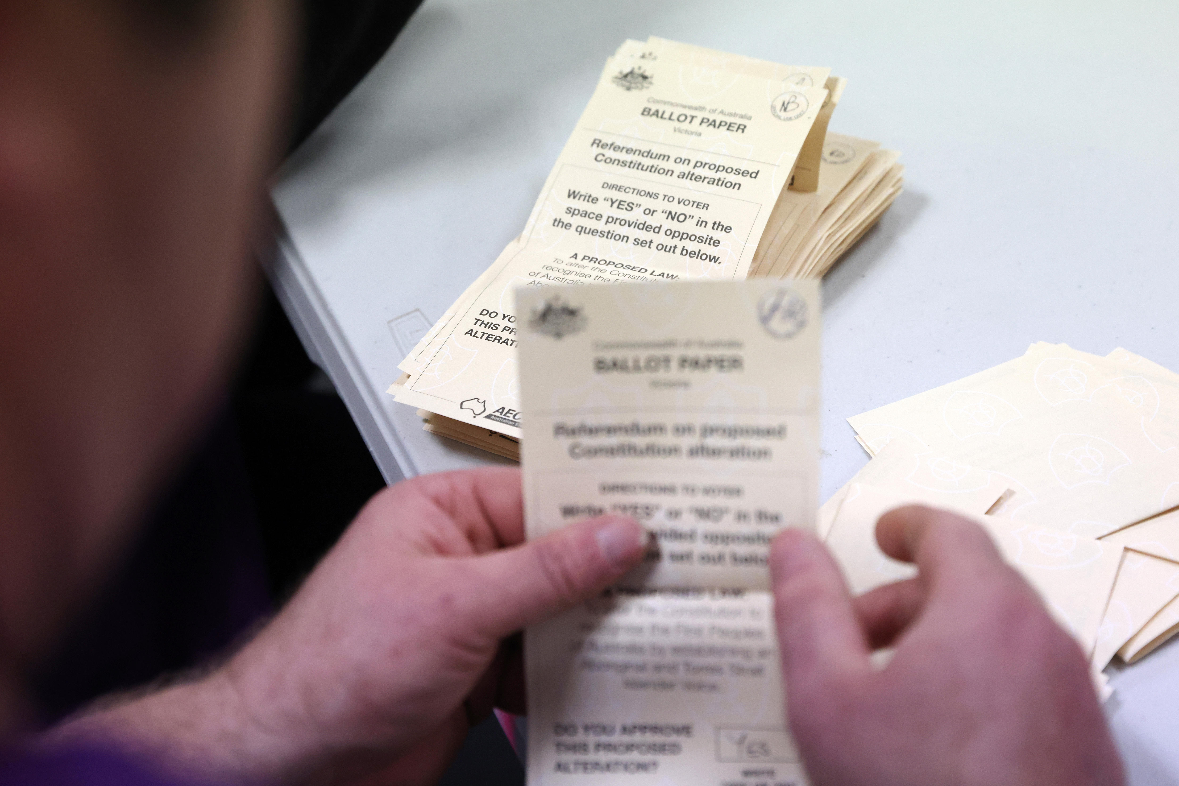 A pile of referendum ballot papers being counted