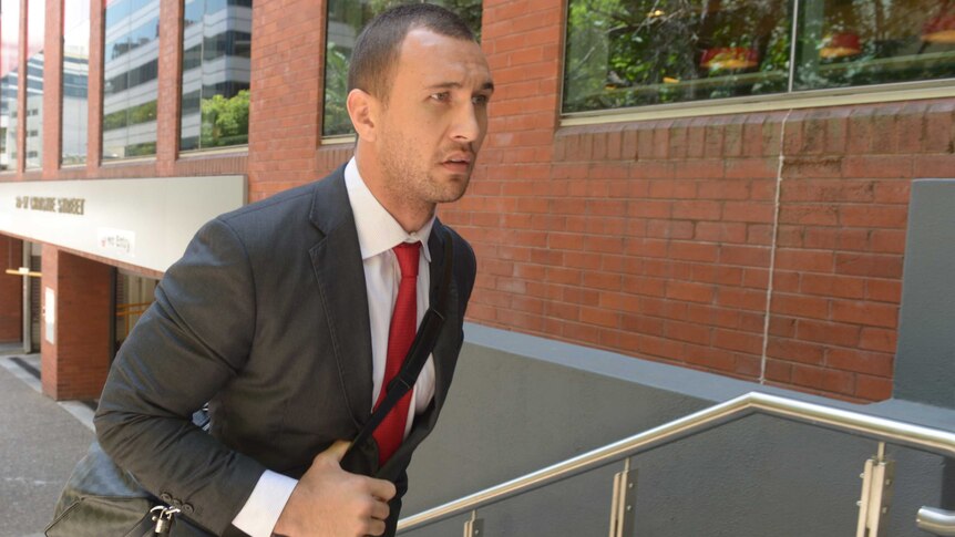 Quade Cooper arrives to face the music