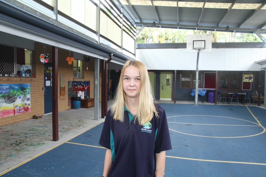 Ariana Roberts standing on the basketball court at Carinity Education Southside school