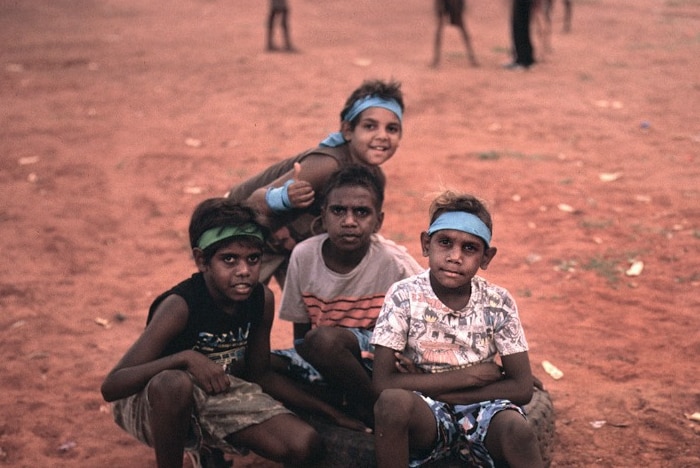 Young indigenous boys smiling for camera