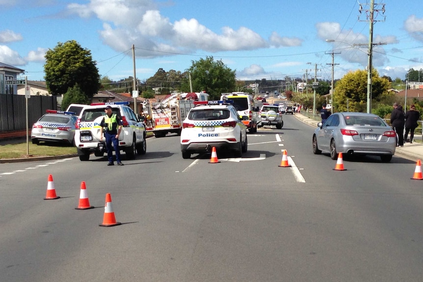 Tasmania Police have blocked the road outside the house in Prospect, Tasmania,.