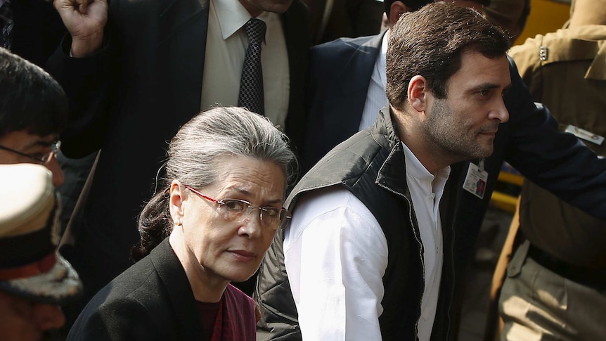 Sonia Gandhi and her son Rahul in a crowd.