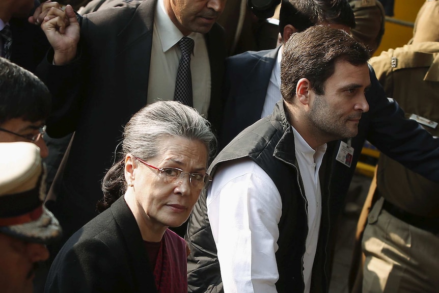 Sonia Gandhi and her son Rahul in a crowd.