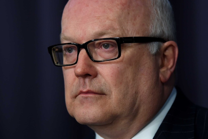 Attorney-General George Brandis addresses the media on July 16, 2014