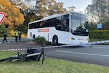 a bus and a bike on the ground