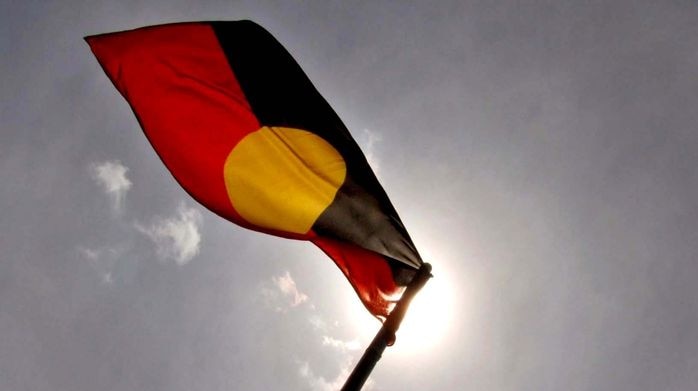 The Aboriginal flag flies at the Aboriginal tent city (Damien Larkins, ABC News)