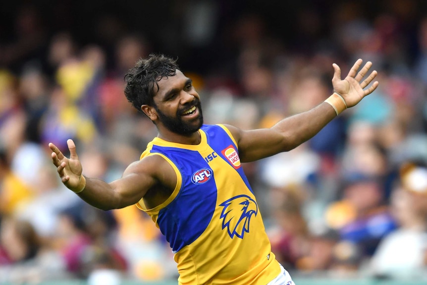 Liam Ryan of the Eagles celebrates kicking a goal against Brisbane at the Gabba.