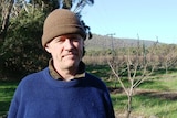 Scott Hansen on his orchard Nubeena