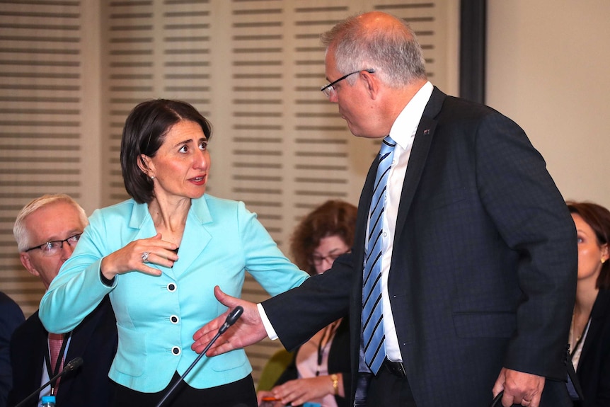 Scott reaches to shake Gladys Berejiklian's hand