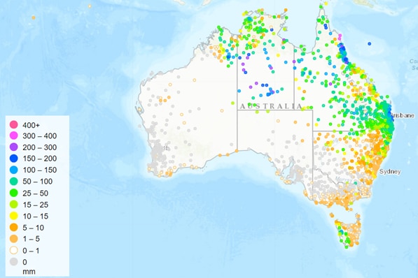 A map of Queensland shows the rainfall totals with a matching legend.