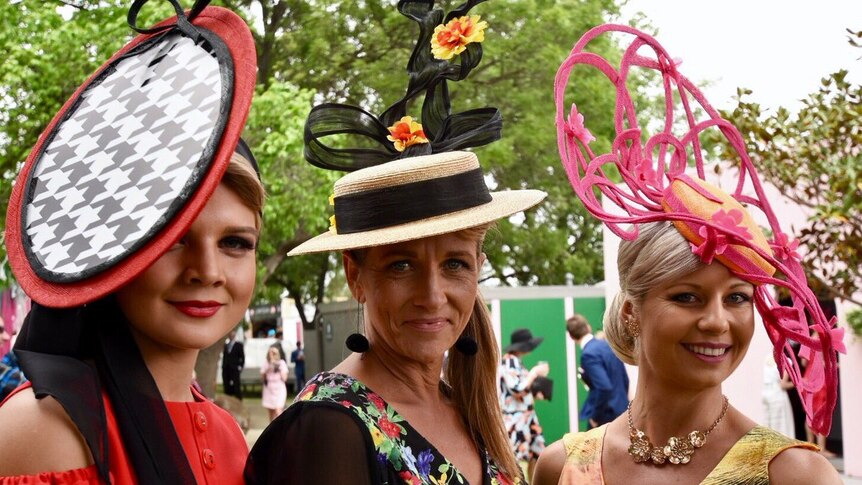 Racegoers parade their hats at Melbourne Cup Day