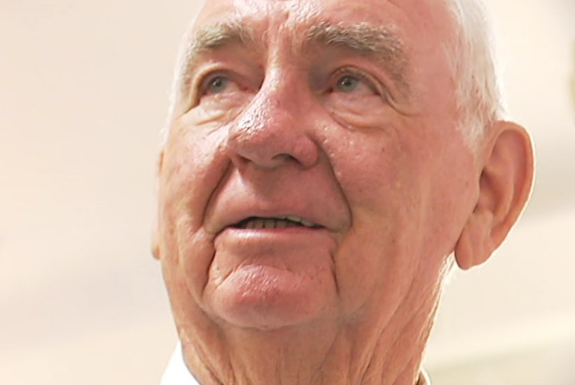 Headshot of former Queensland premier Mike Ahern looking upwards on December 20, 2018