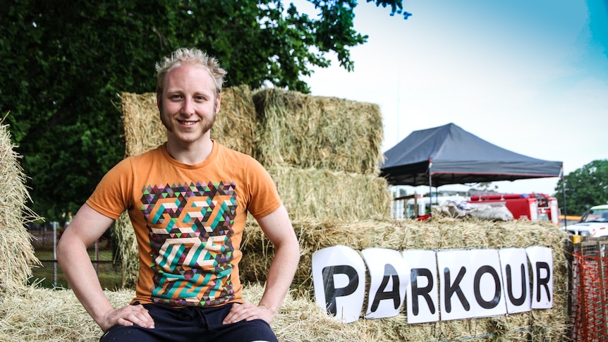 Bendigo parkour instructor Flynn Patreo sitting on