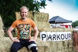 Bendigo parkour instructor Flynn Patreo sitting on