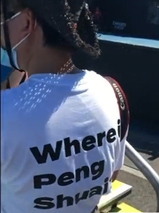 A video still shows a woman wearing a T-shirt reading 'Where is Peng Shuai?'