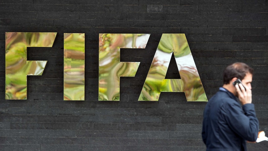 The logo of FIFA in front of the organisation's head office in Zurich, Switzerland, on September 26, 2014.