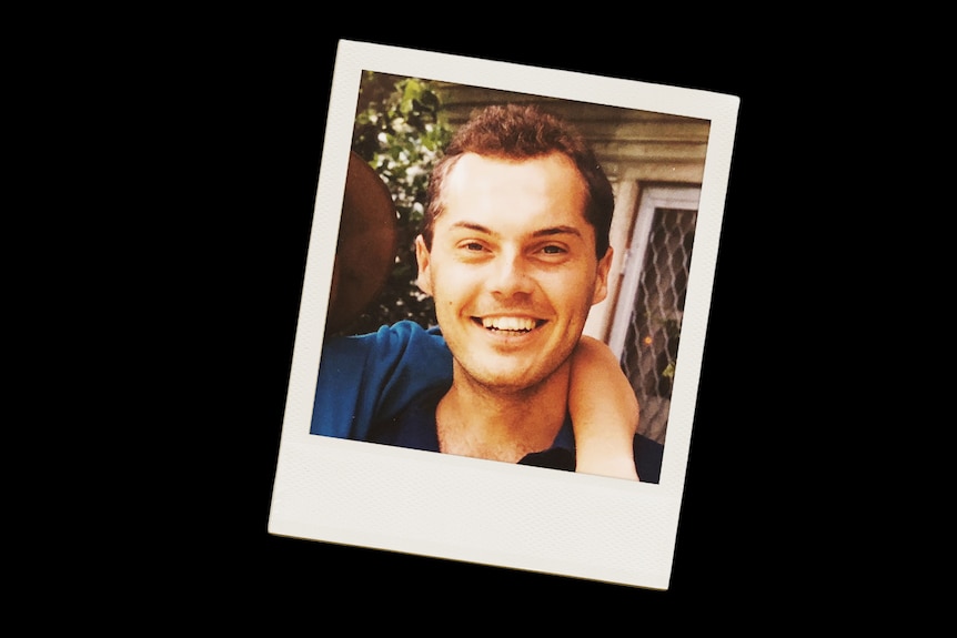 A polaroid photo of a young man.