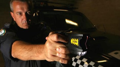 File photo: NSW Policemen with a taser gun (Flickr: puplik16)