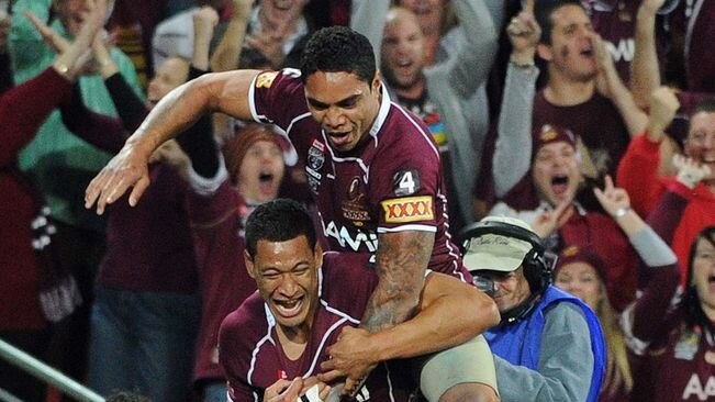 Origin immortals: Israel Folau celebrates the first of two tries on the night with Willie Tonga.