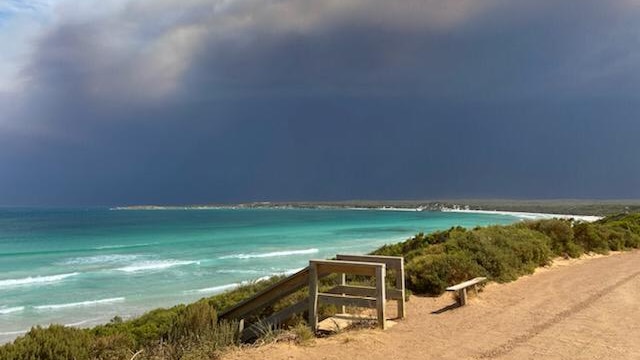 Smoke clouds behind a bay