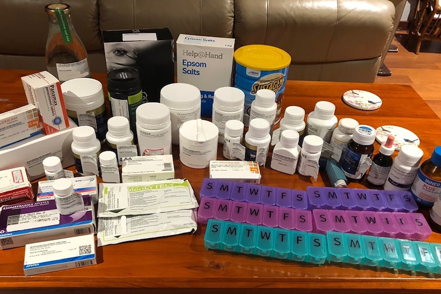 A table full of medication needed for lyme disease treatment