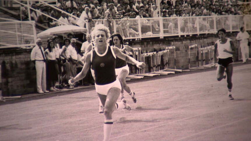 Former East German relay runner Ines Geipel is seen racing in an old photo.
