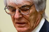 Formula One supremo Bernie Ecclestone arrives for the opening of his trial at court in Munich.