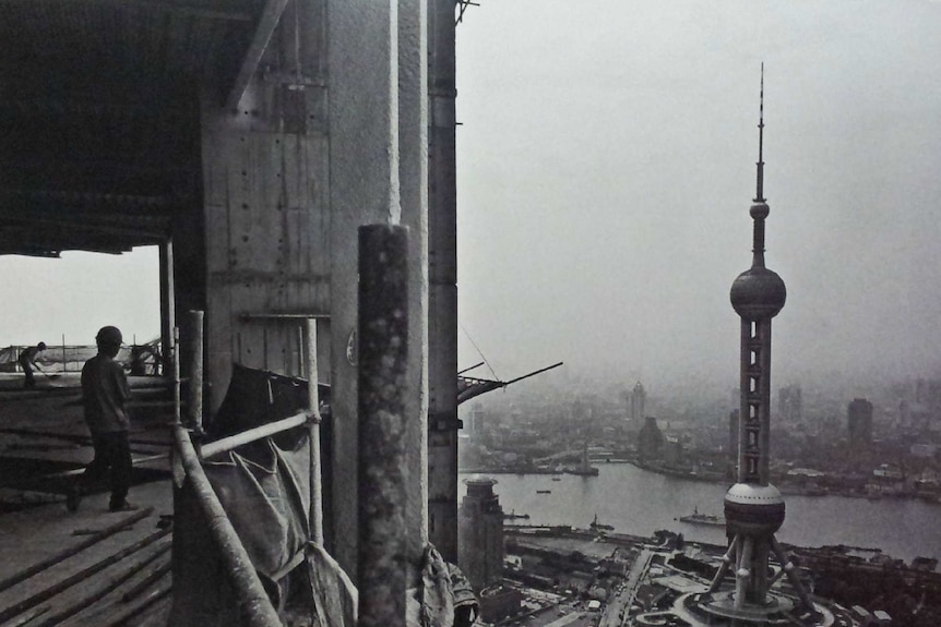 Construction workers were working on the site while the famous Peral Tower was just not far away.