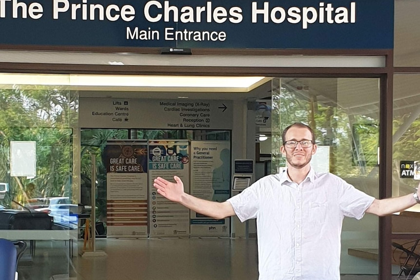 Joshua Leveridge stands outside the Prince Charles Hospital in Brisbane.