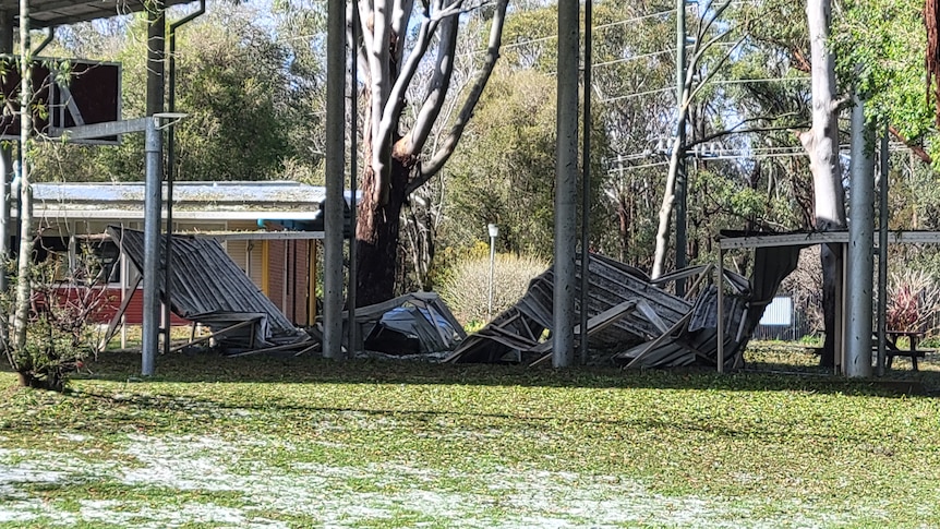 Steel roof fallen on top of playground. 