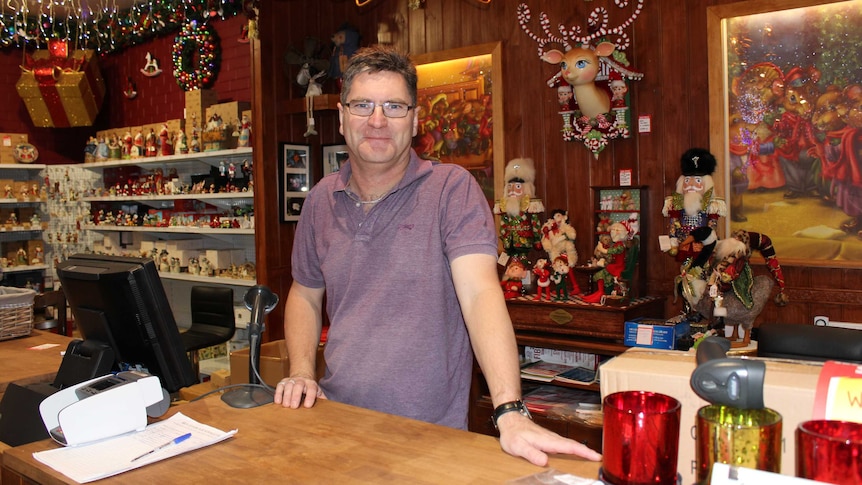 Sean Byron surrounded by Christmas decorations at his store in Toodyay.