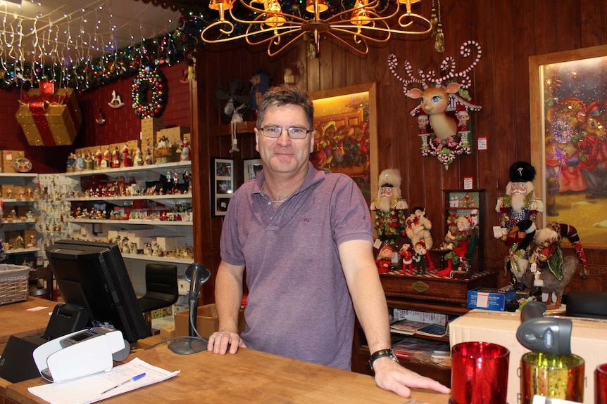 Sean Byron surrounded by Christmas decorations at his store in Toodyay.